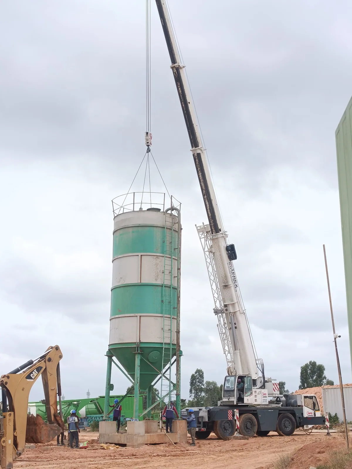 Crane lifting an industrial vessel