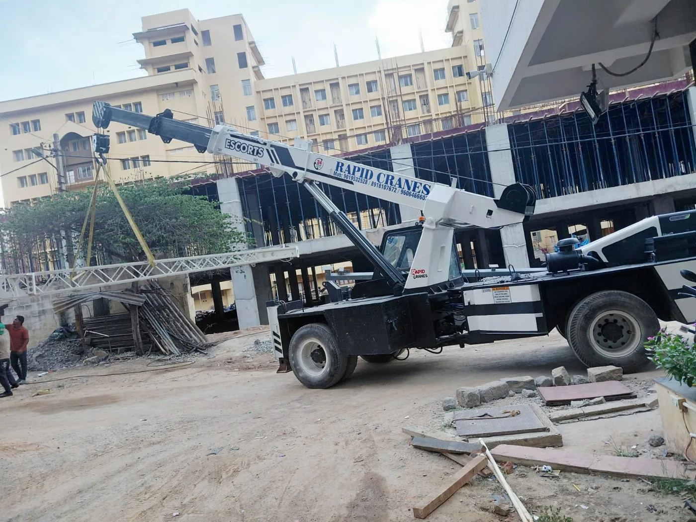 Rapid Cranes pick-and-carry crane moving a lattice section